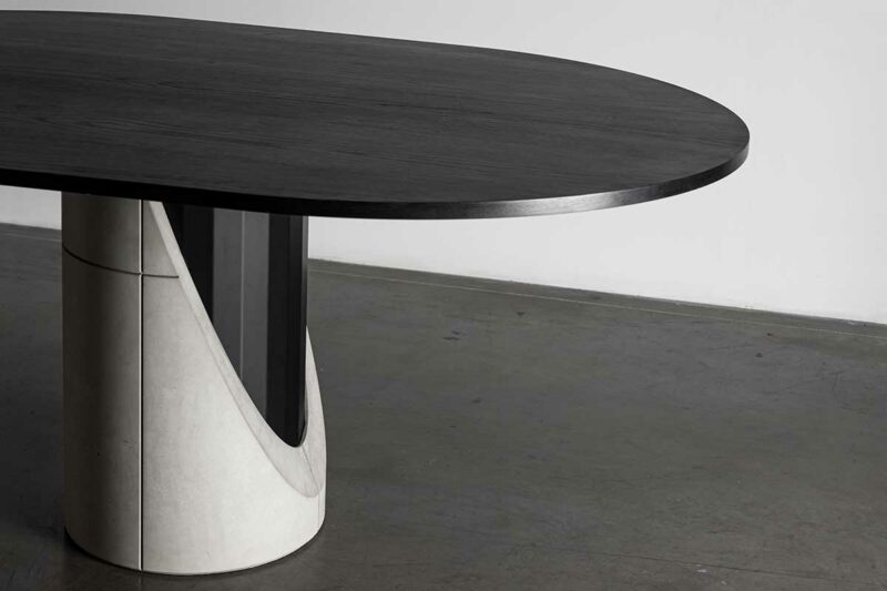 Table de salle à manger design en béton, métal et bois