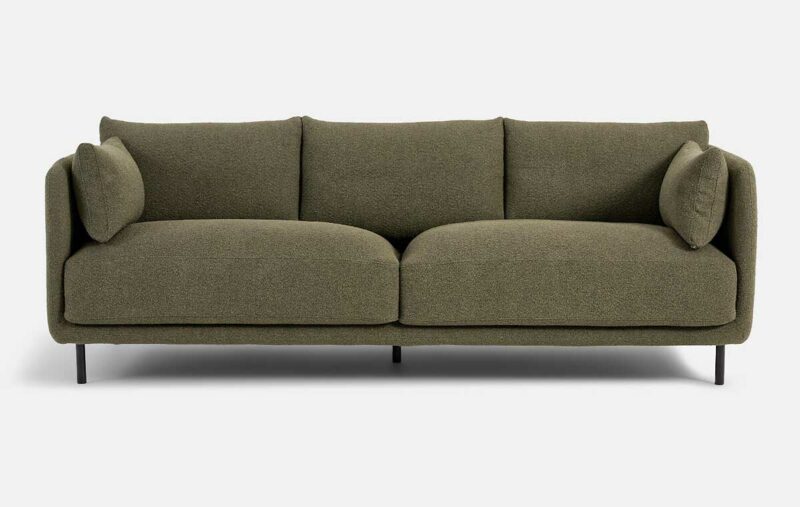 Confort kaki : canapé minimaliste sur pieds métalliques fins